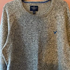 Never worn men’s gray sweater.